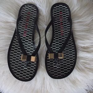 Coach black and white checked flip flops